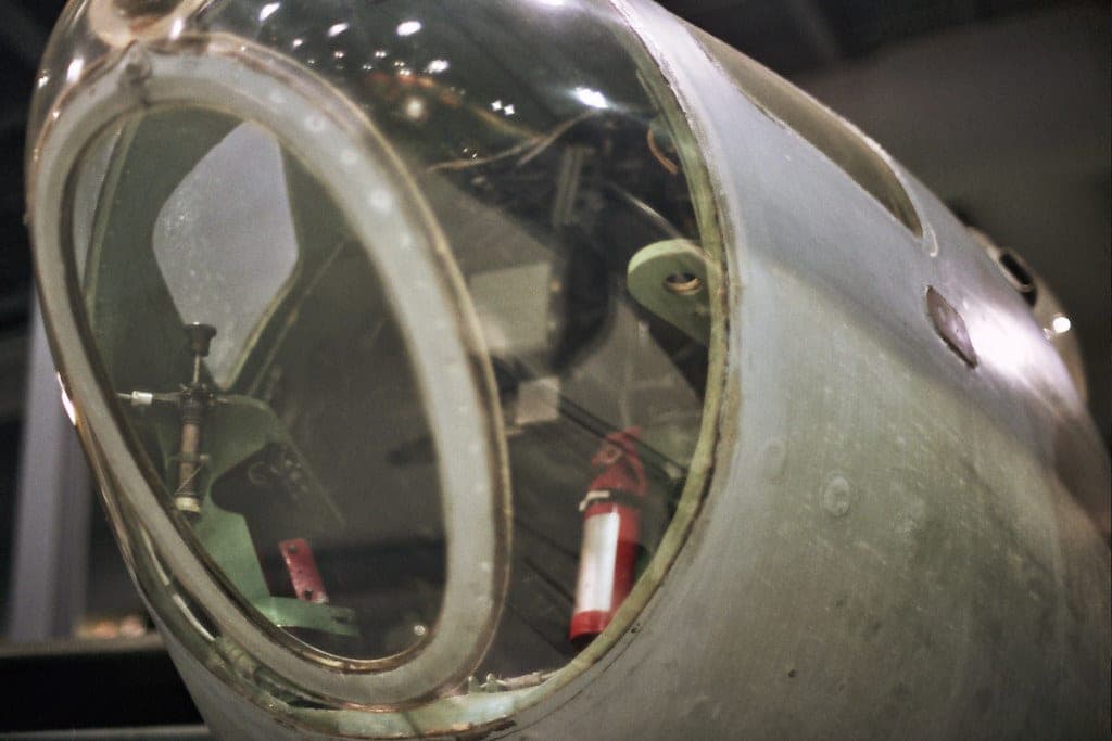 A pedestal pump with its motor mounted above the water line on a column